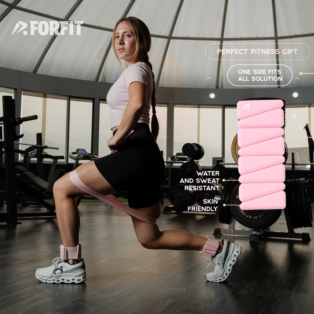 Modelo entrenando con pesas rosadas